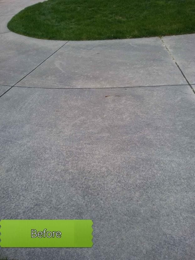 Before a completed driveway power washing project in the  area